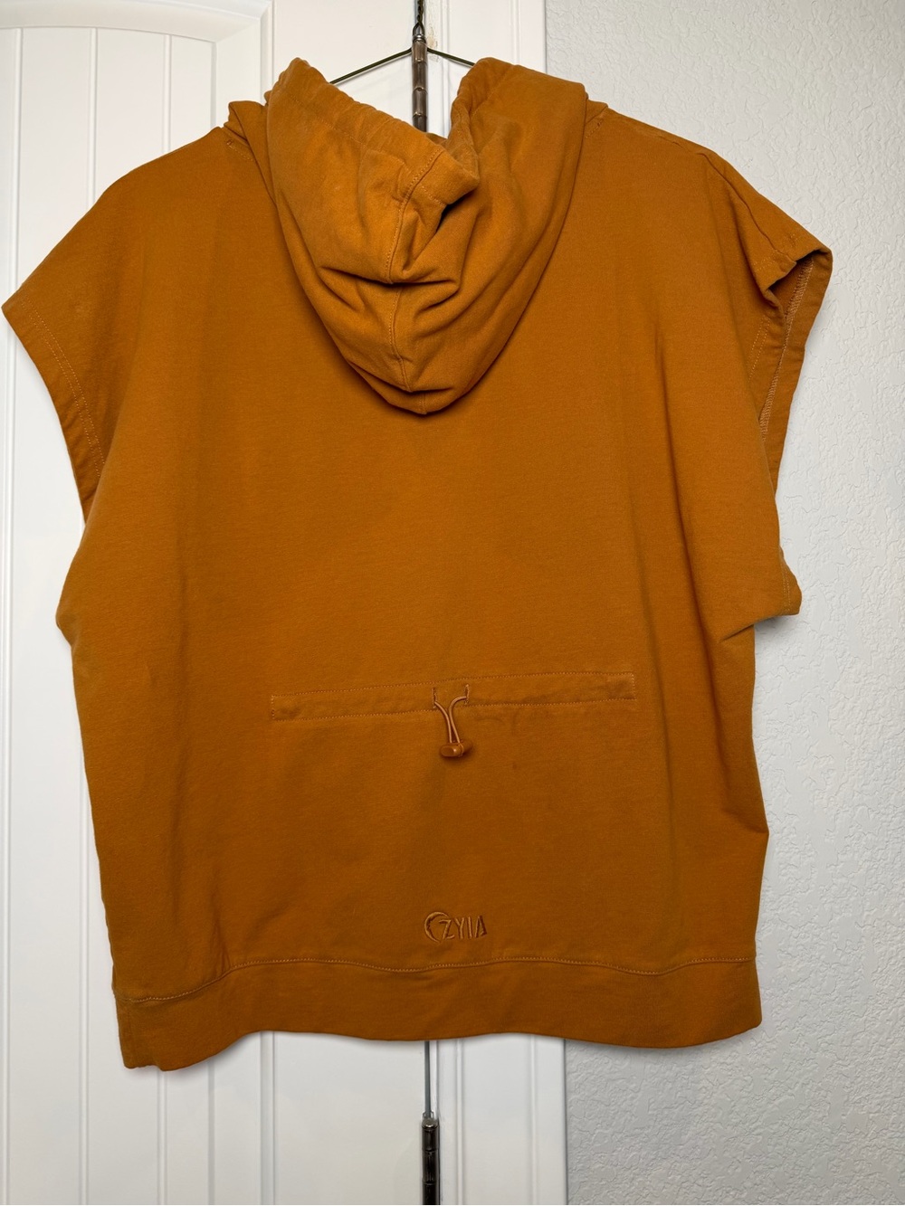ZYIA Short Sleeve Hooded Pullover in Rust Orange with White Drawstrings - Picture 3 of 4